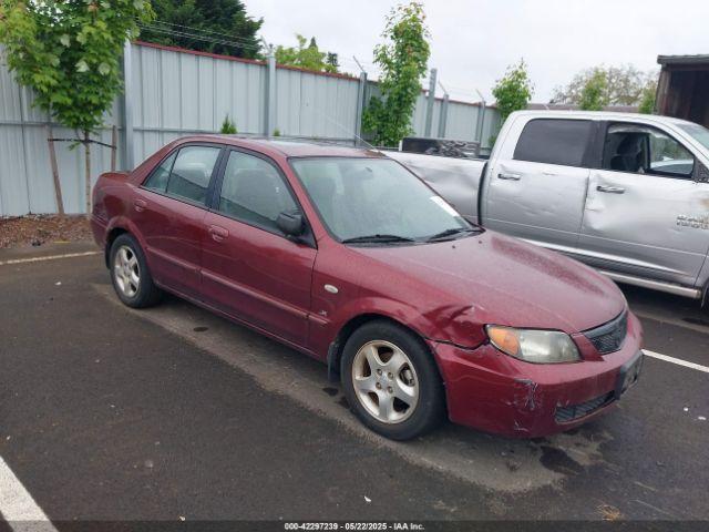  Salvage Mazda Protege